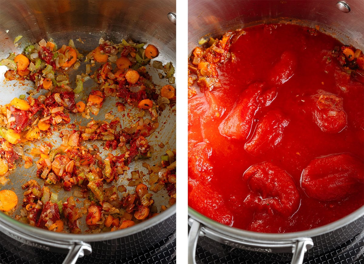 A large pot on the stove with diced carrots, celery, and onions cooking on the left and with added canned tomatoes on the right.