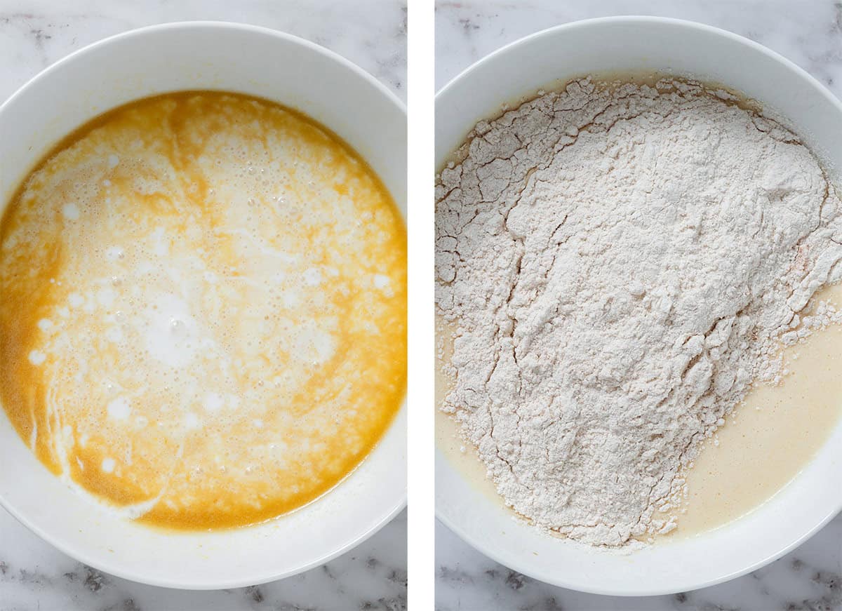 Milk being added to wet ingredients in a white bowl on the left and flour being added on the right.