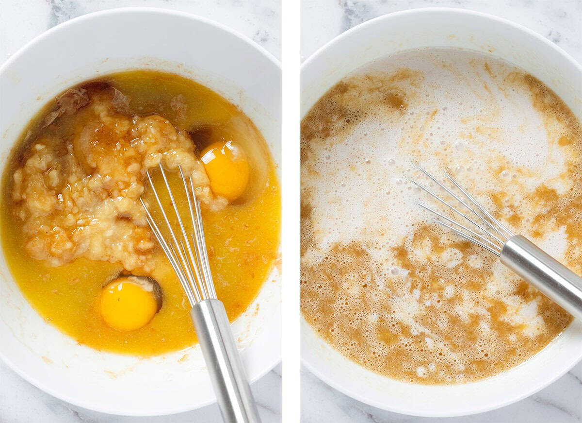 Eggs, mashed banana, milk, and other wet ingredients being whisked together in a large white bowl.
