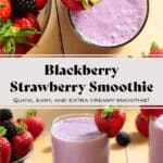 A light purple smoothie in a short glass garnished with a strawberry and blackberries around the glass.