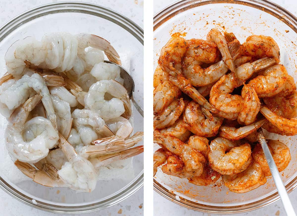 Raw shrimp in a glass bowl mixed with oil on the left and red cajun seasoning on the right.