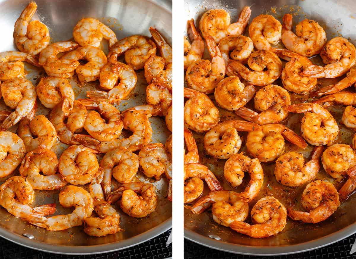 Shrimp cooking with cajun seasoning in a large stainless steel pan.