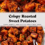 Crispy charred roasted diced sweet potatoes in a white bowl with a beige rim sprinkled with flaky sea salt and finely chopped fresh parsley and with two serving forks on the right.