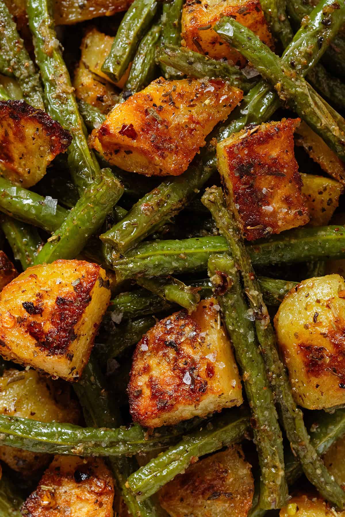 Crispy golden roasted diced potatoes and green beans prinkled with flaky sea salt.