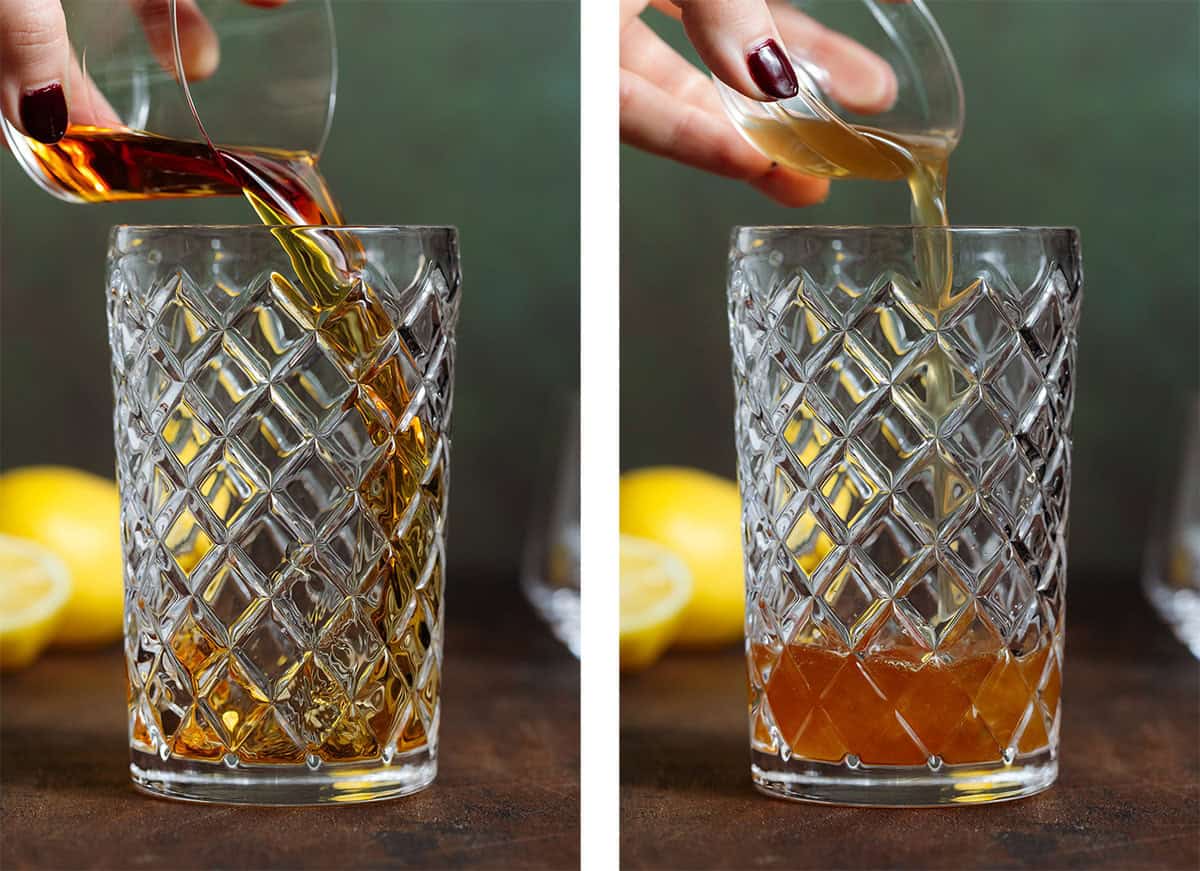Bourbon and ginger syrup being added into a glass cocktail shaker.