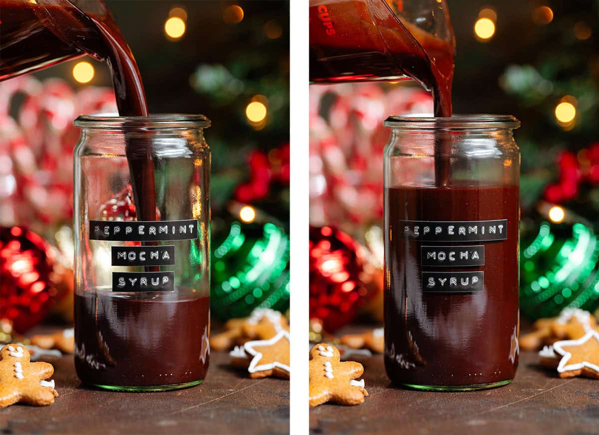 Rich chocolate peppermint syrup being poured into a tall glass jar with a black embossed label on the front.