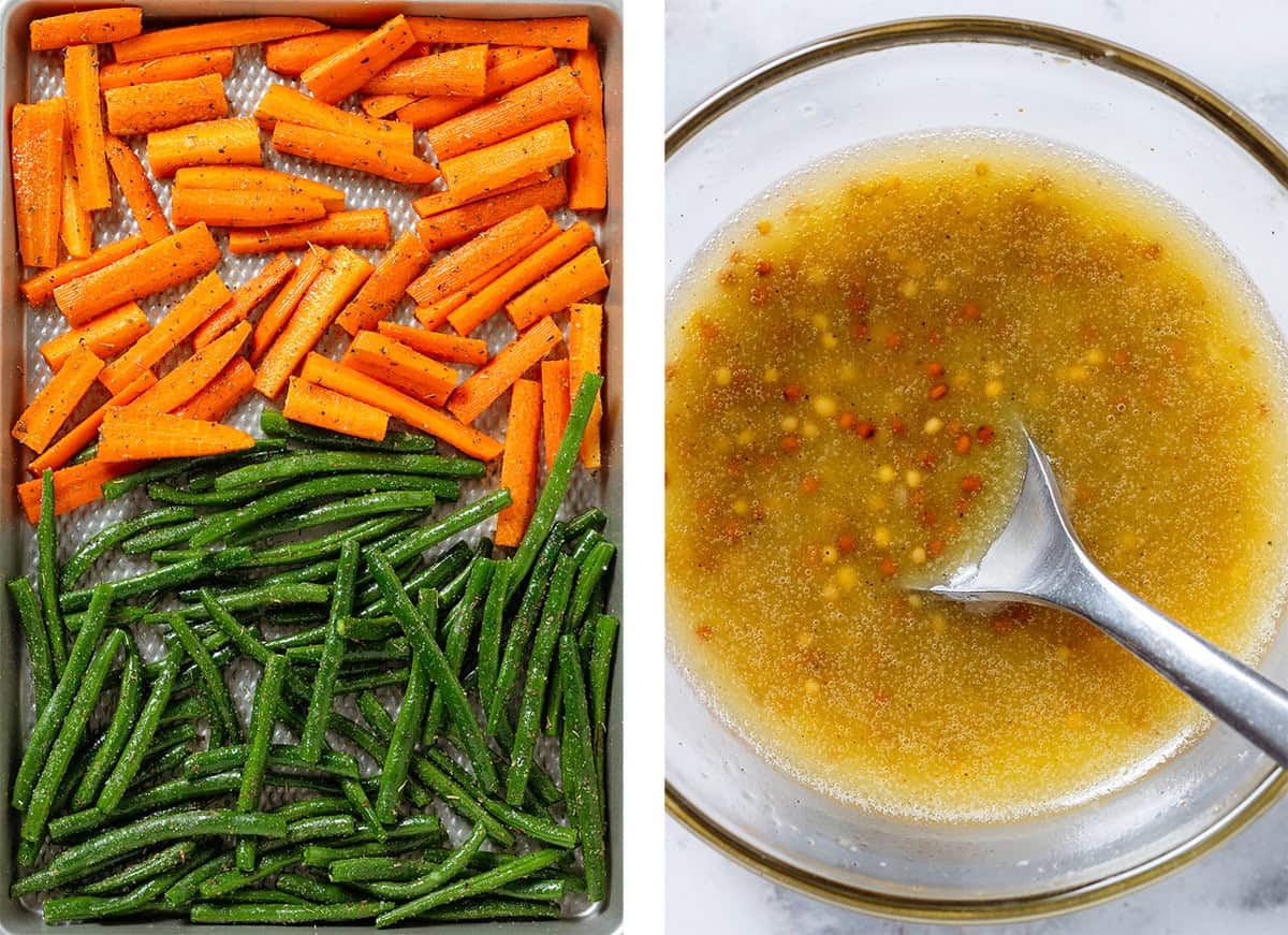 Raw green beans and chopped carrots with spices and oil on a baking sheet on the left and mustard vinaigrette in a glass bowl on the right.