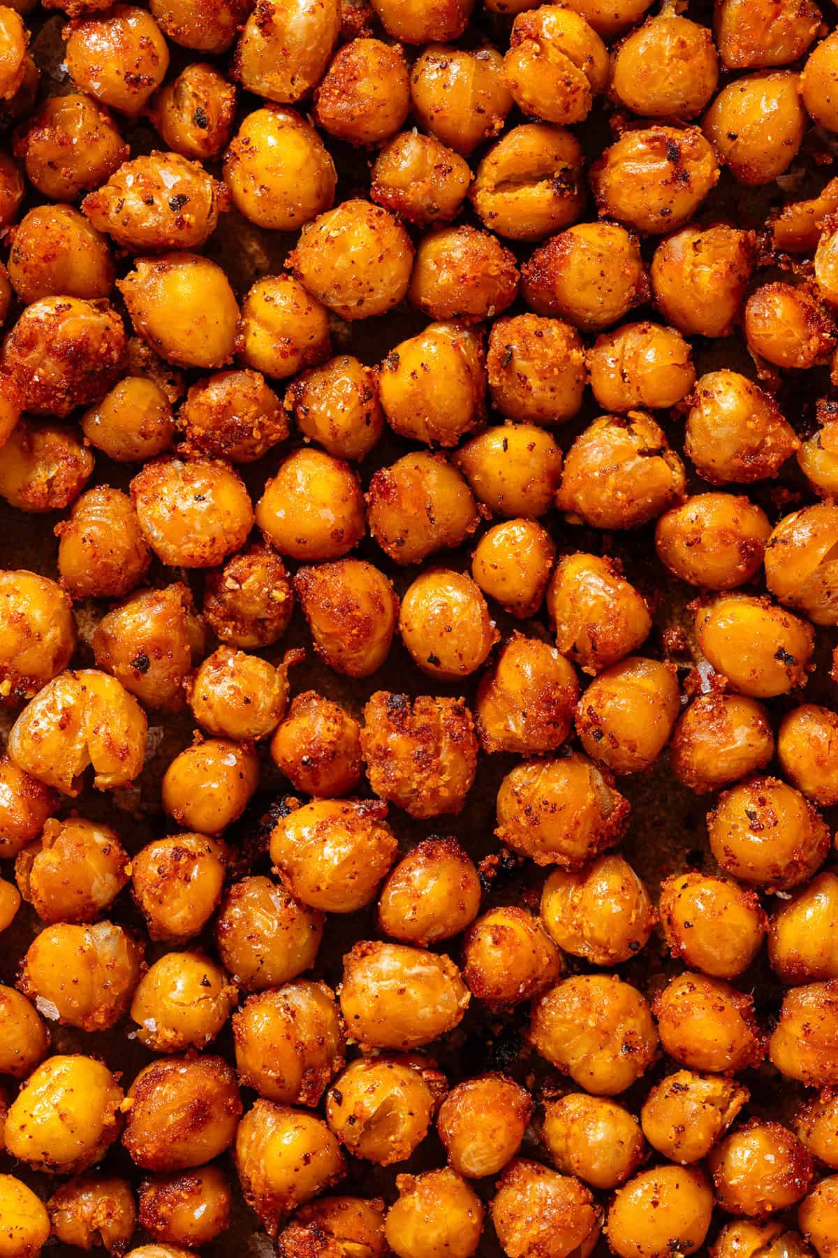 Golden crispy roasted chickpeas with a coating of spices.
