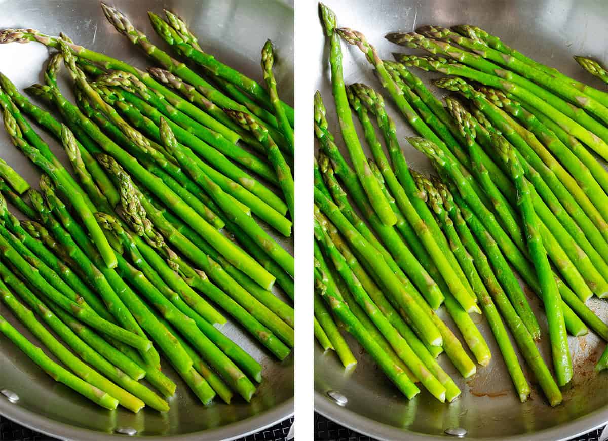 Asparagus cooking and browning in a large stainless steel pan with oil.