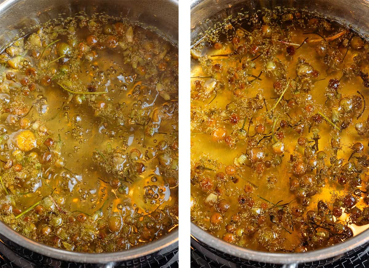 Dried chamomile flowers steeping in a small pot on the stove after simmering with water and sugar to make syrup.