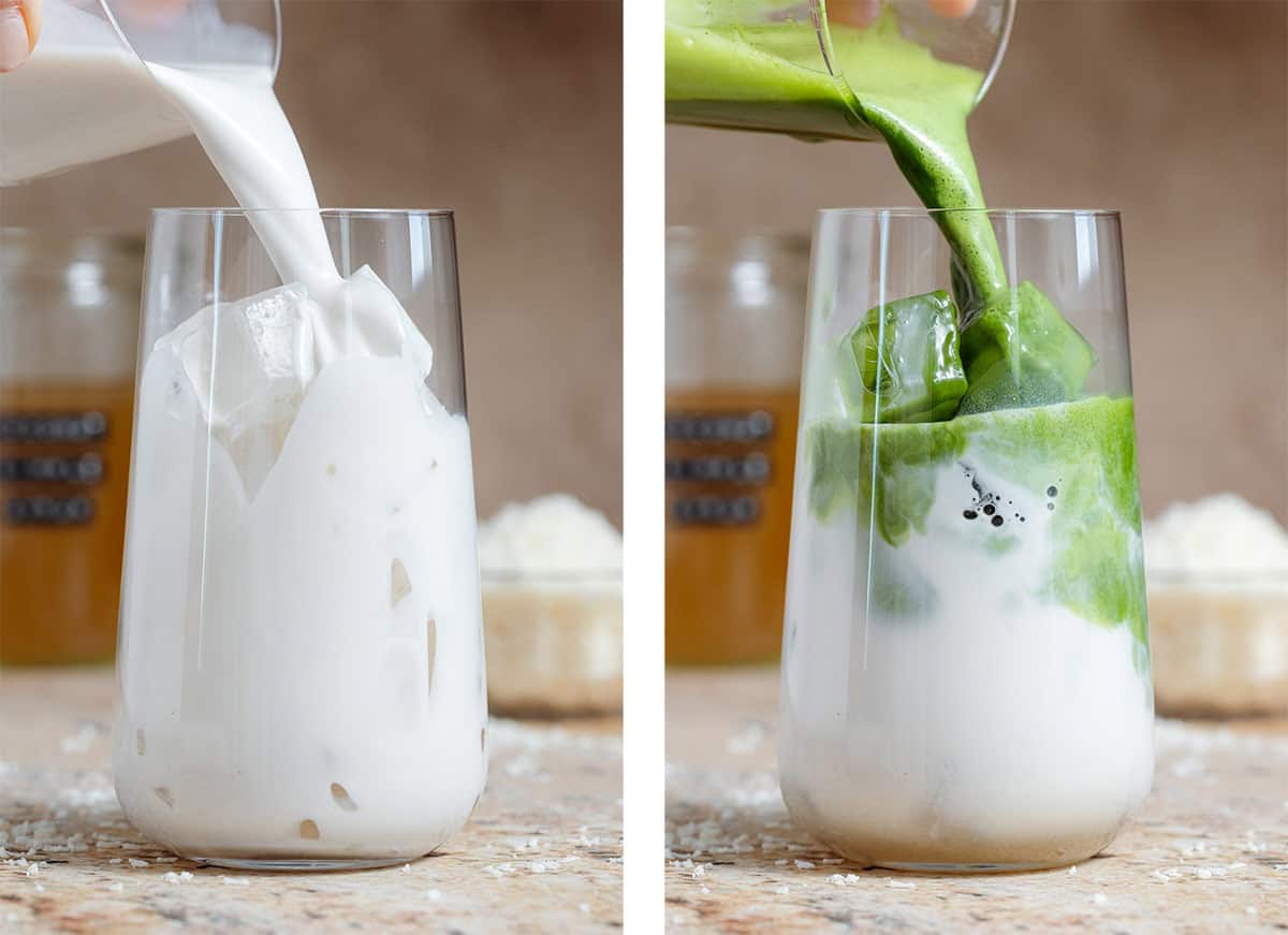 Milk and whisked matcha being poured over ice in a tall glass.