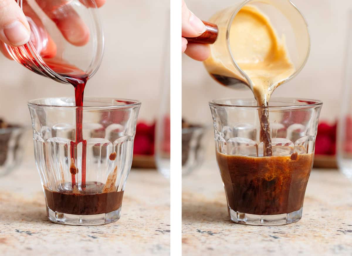 Raspberry syrup, chocolate syrup, and fresh espresso being poured into a small glass cup.