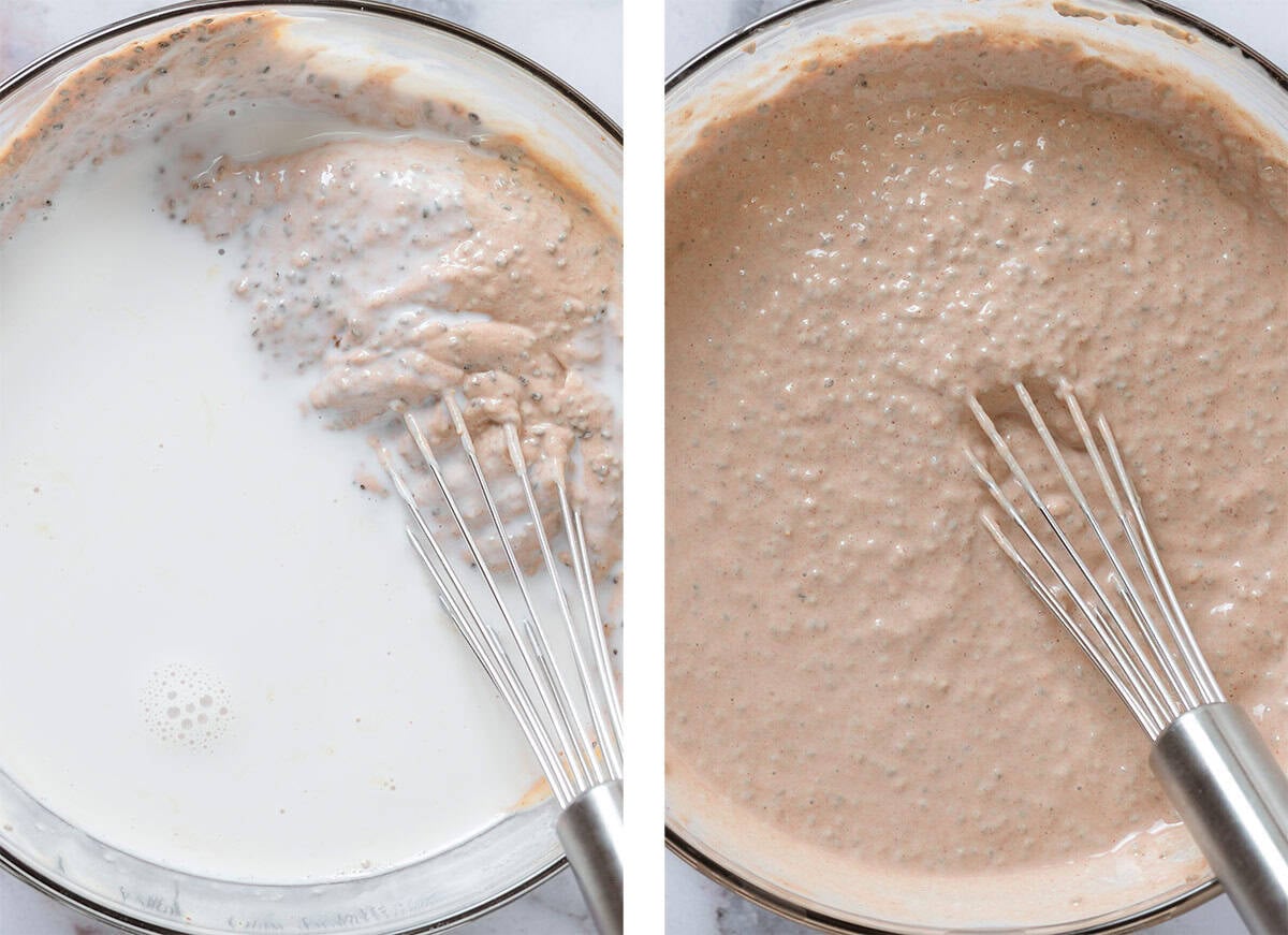 Chia seeds with yogurt and chocolate protein powder being whisked with milk to create pudding in a large glass bowl.