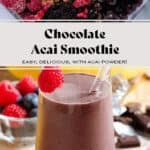 Smoothie ingredients in a blender on top and purple chocolate acai smoothie in a tall glass with a glass straw garnished with a fresh raspberry on the bottom.