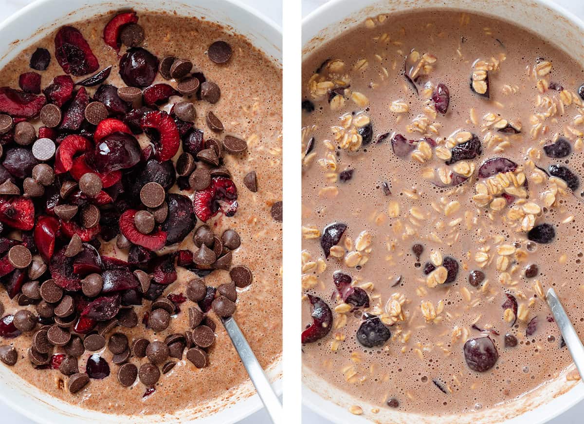 Baked oats batter in a white bowl with added chocolate chips and chopped fresh cherries.