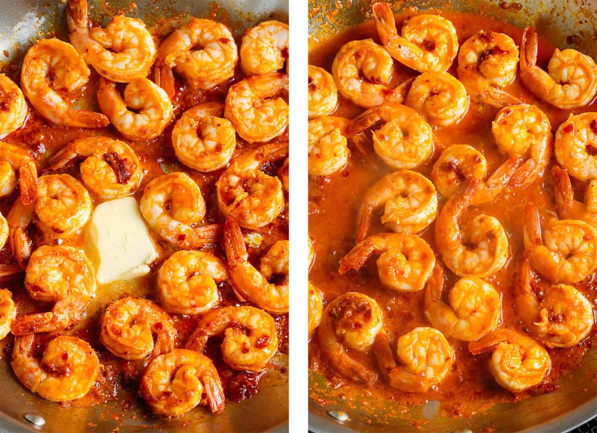 Shrimp cooking in orange harissa sauce in a large pan with added butter slowly melting.