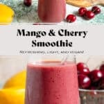 A mango cherry smoothie in a tall glass with a glass straw garnished with a fresh cherry and a slice of mango with more of the fruit in the background.